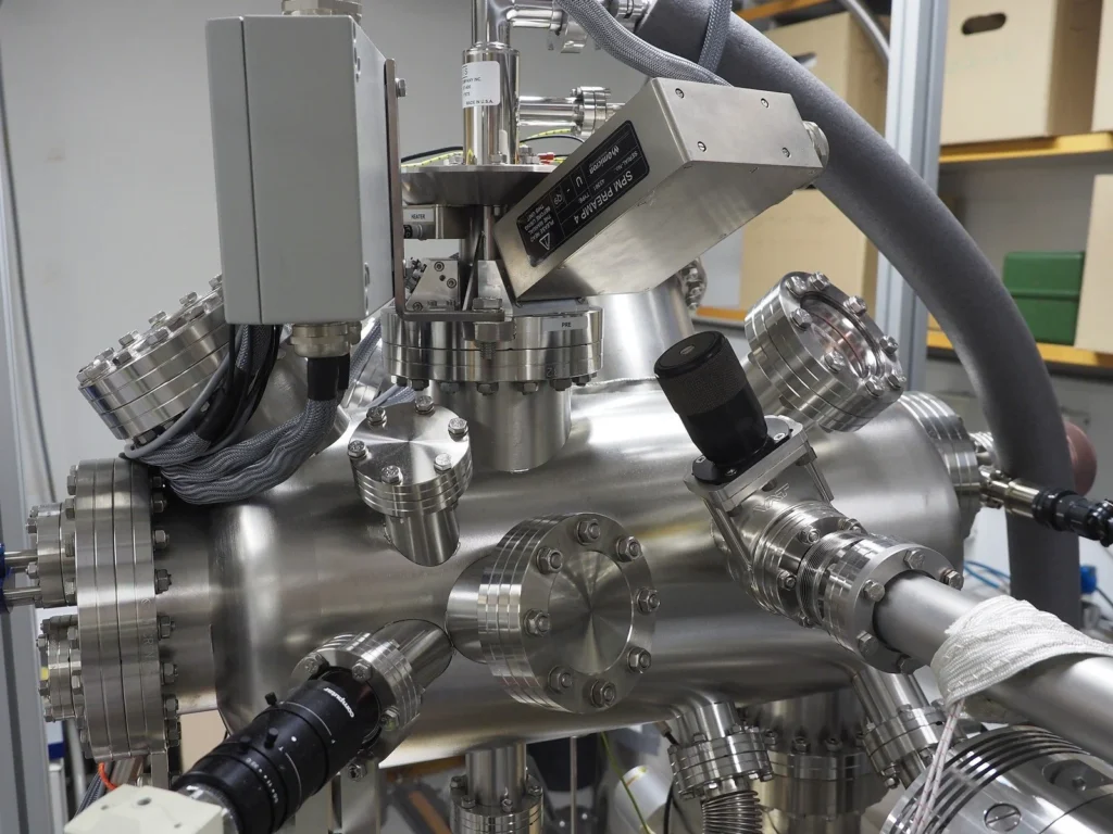 High-vacuum chamber system for semiconductor surface analysis and material characterization with multiple ports and sensors