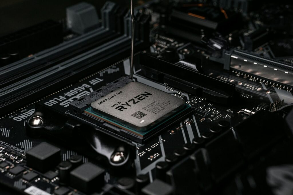 Close-up of AMD Ryzen processor installed on ASUS TUF B450M-PLUS GAMING motherboard